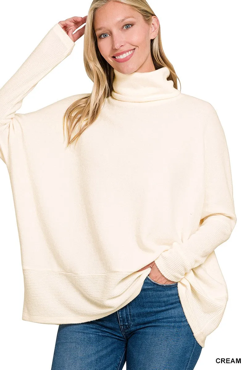 BRUSHED MELANGE HACCI TURTLENECK SWEATER