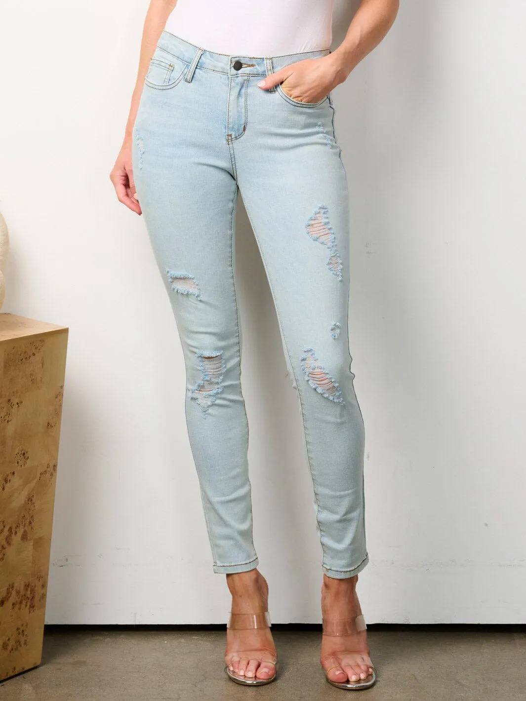 WOMEN'S BUTTON CLOSURE DISTRESSED SKINNY DENIM PANTS